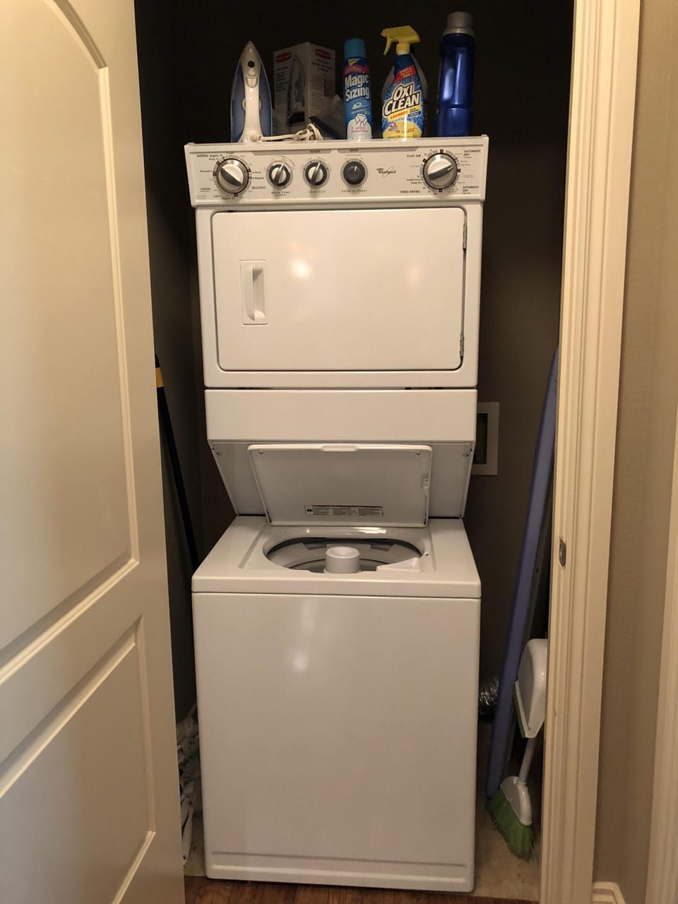 Full size laundry with detergent and dryer sheets provided.