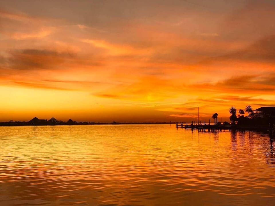 Look at these colors. It looks so peaceful and serene. Spectacular sunset shot over Offatts Bayou.