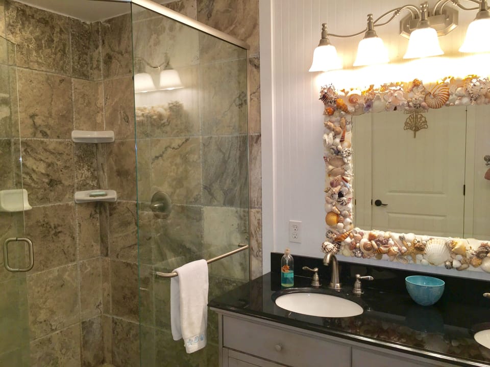 Master bathroom with large shower and two sinks