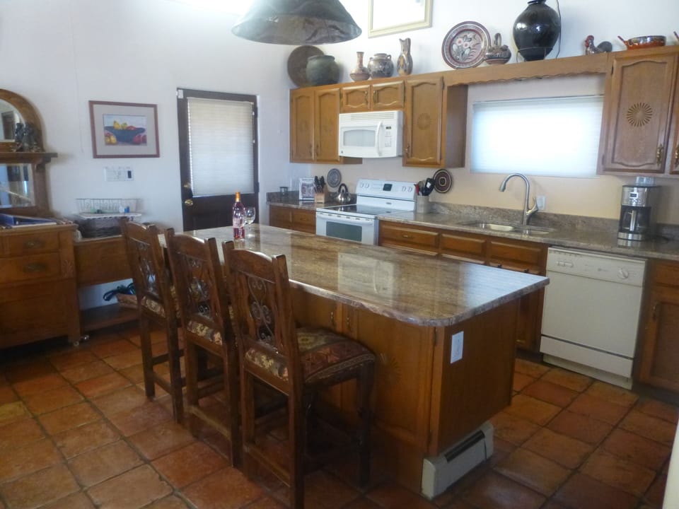 Kitchen area showing exit to back patio