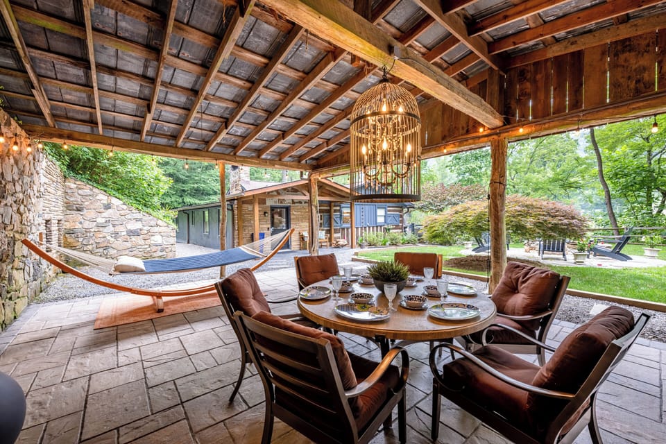 Enjoy outdoors in any weather under hand-hewn timber beams