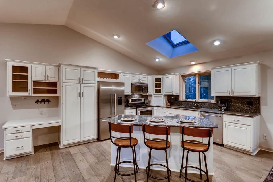 3 additional counter height seats at the kitchen island