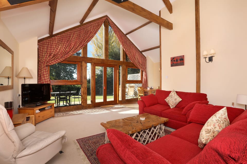 The lounge overlooking the private patio area and wonderful views