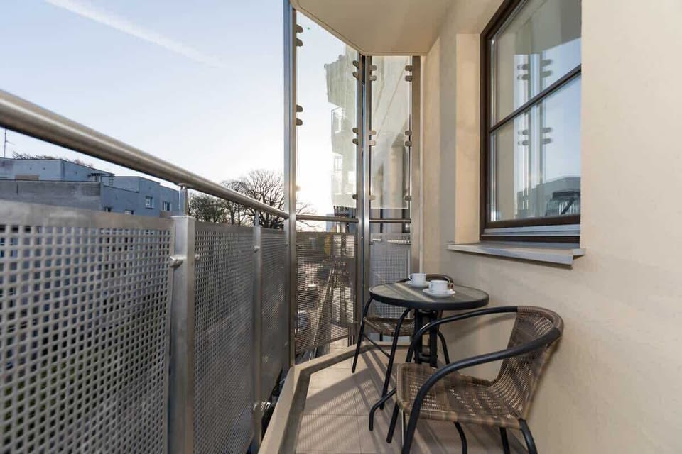 Balcony with garden furniture, where the guests can enjoy their morning coffee and snacks.