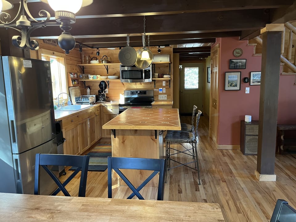 Kitchen/Dining area with island. Seating for 8.