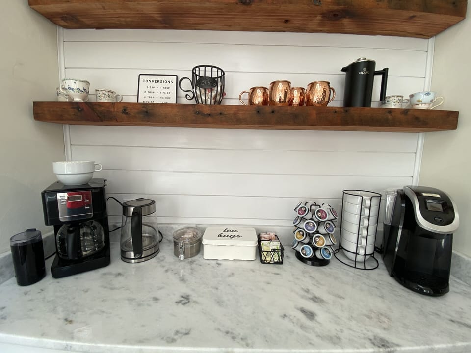 W/Donut Shop coffee, Bigelow tea, creamers, French press, bean grinder & more! 