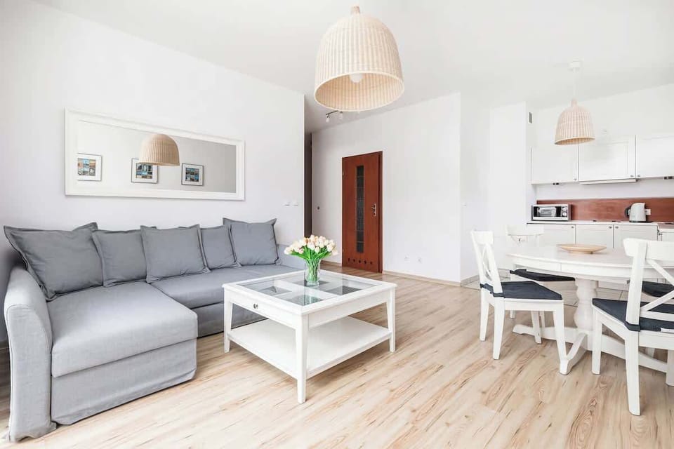 
Cosy living room with grey sofa, perfect atmosphere for spending time with loved ones 