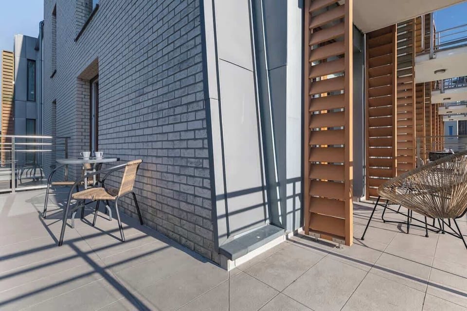 Balcony with a nice view and functional garden furniture, which the guests can use to enjoy the pleasant atmosphere.