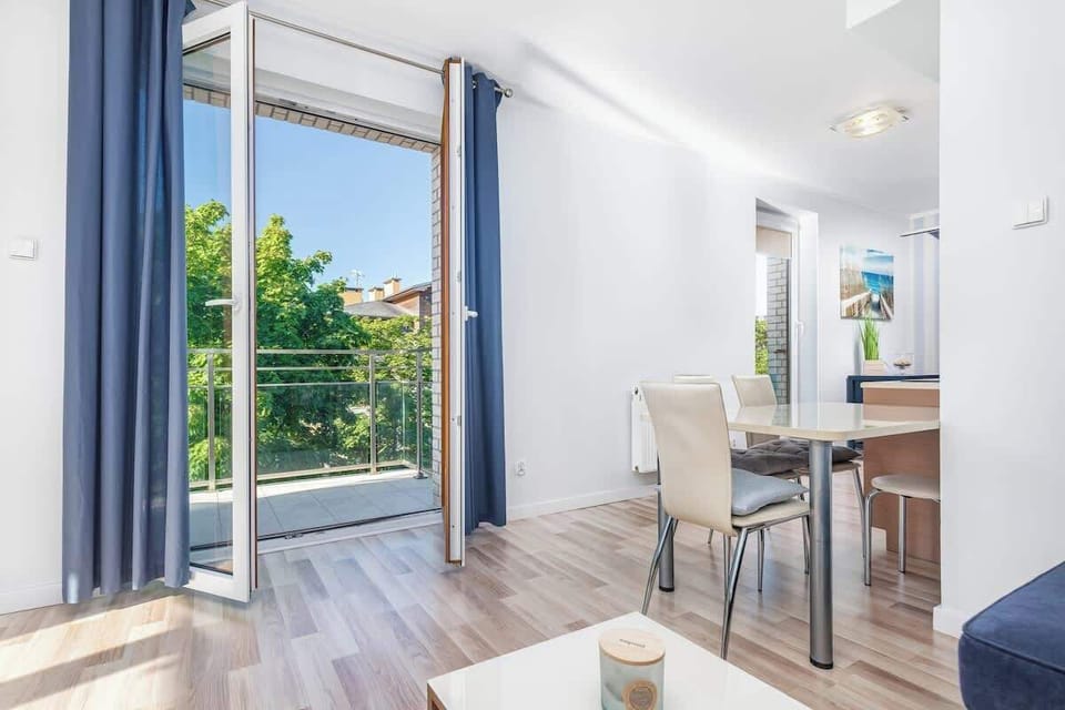 Exit to the atmospheric furnished balcony, where the guests can enjoy their meals and morning coffee.