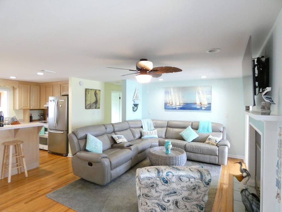 Living Room with roomy sectional reclining sofa