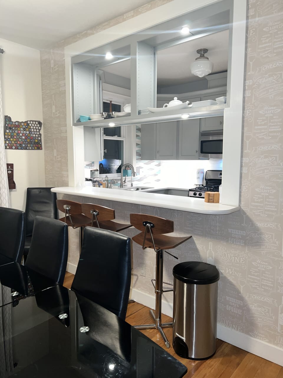 peaking into the kitchen- one in the kitchen, one in the