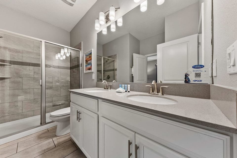 Style and comfort meet in this guest full bath with walk in shower
