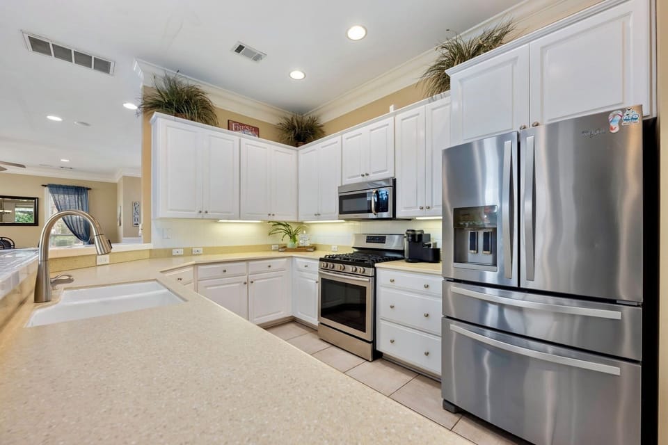 Large stocked kitchen with gas grill