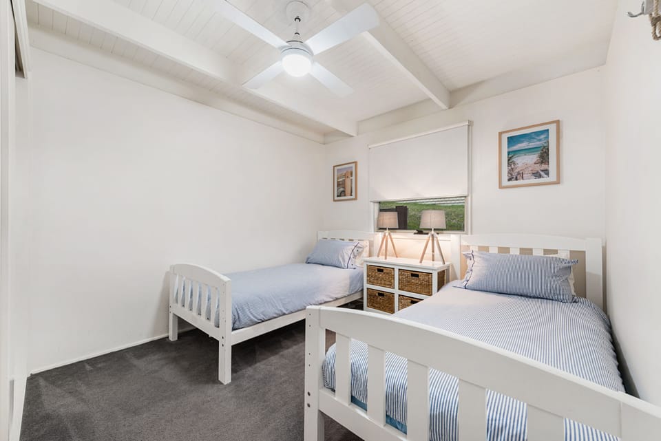 The 4th bedroom with 2 single beds