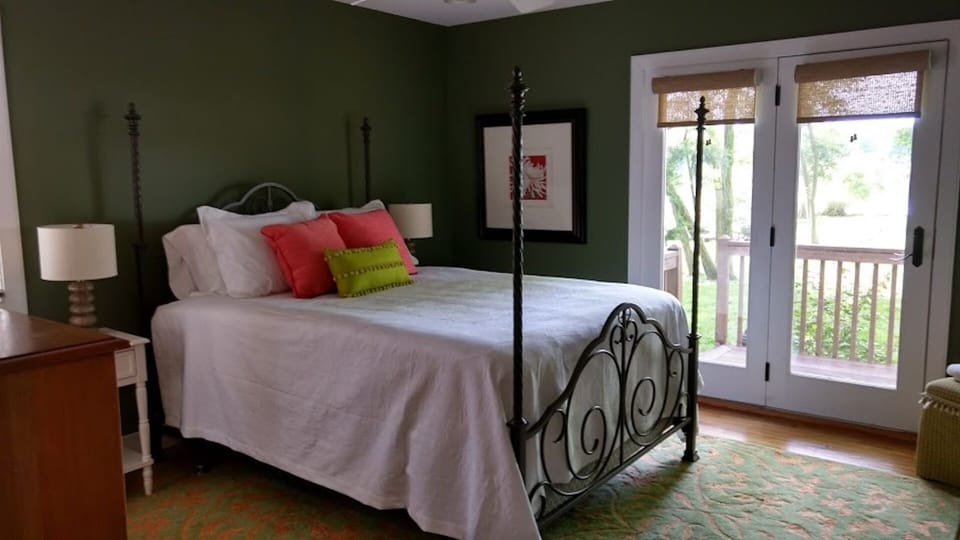 2nd Master Bedroom with water view and entrance to deck.
