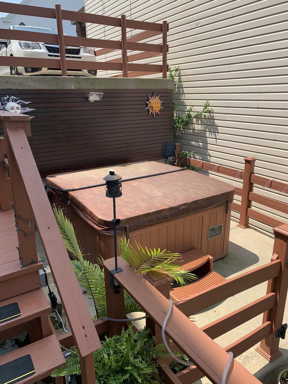 Year round hot tub with driveway above
