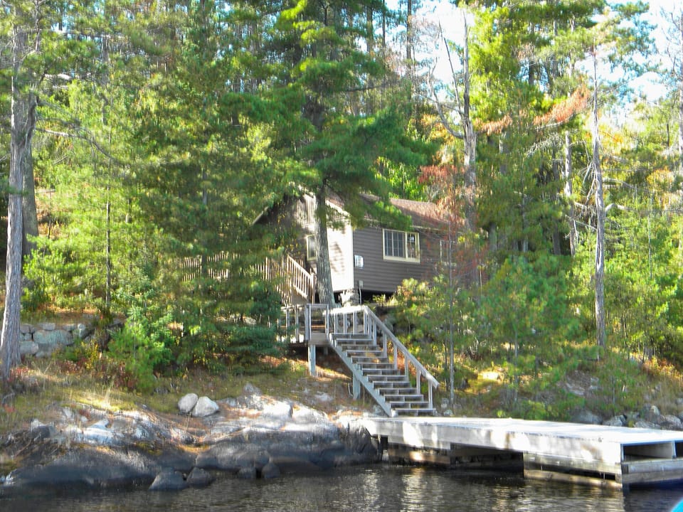 View of dock leading to deck and cabin 