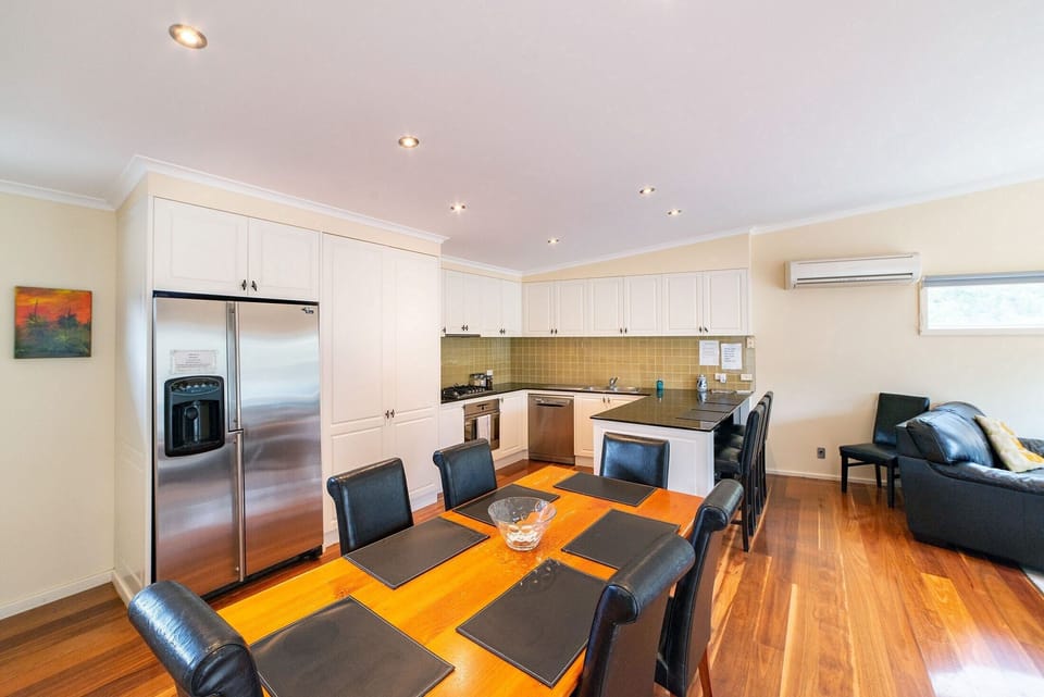 Elegance in dining: Six-seater setup, stylish and intimate. A delightful experience awaits.