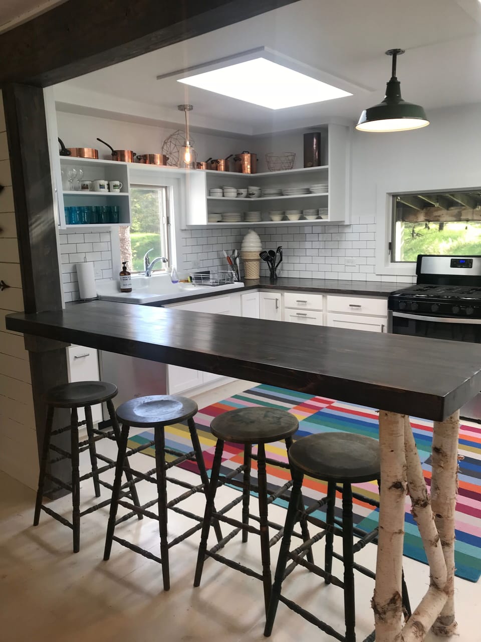 Kitchen that opens to the main room