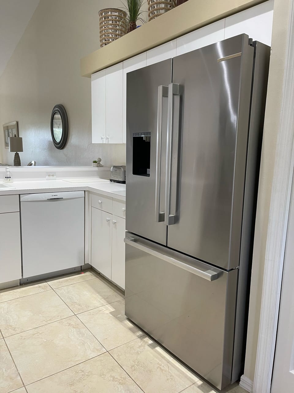 Plenty of space in the stainless steel Bosch  refrigerator with water/ice maker.