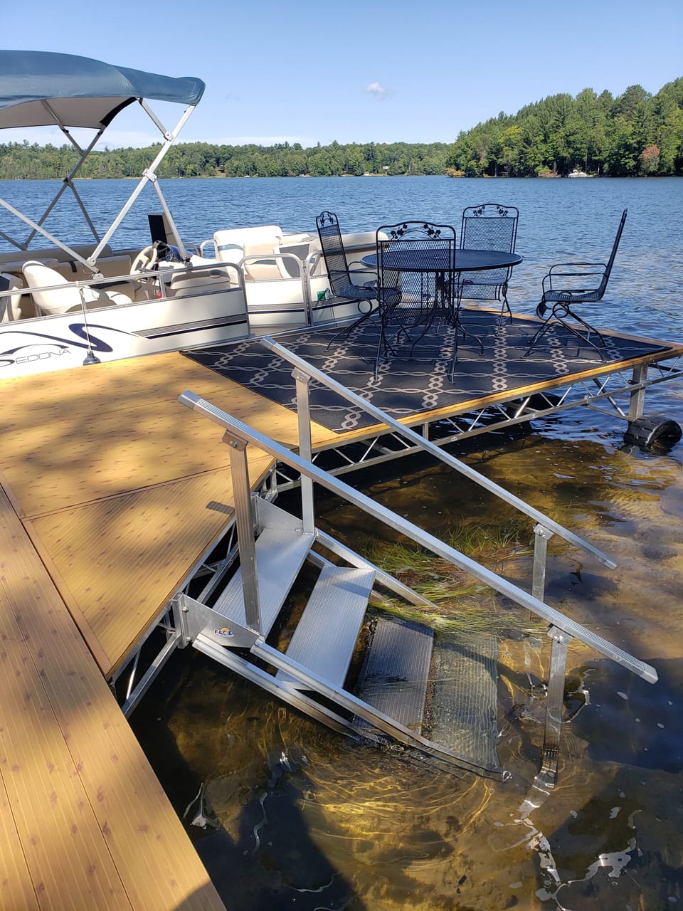 Easy entry to lake and pontoon for cruising! Dine lakeside, too!
