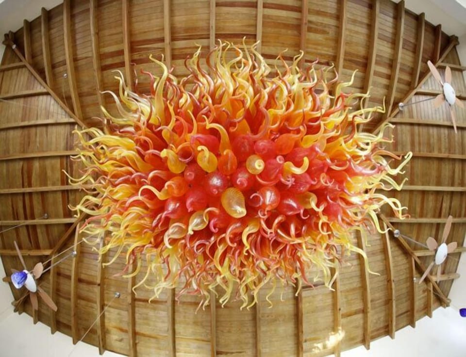Hand blown glass chandelier inspired by a the St. John sunrise