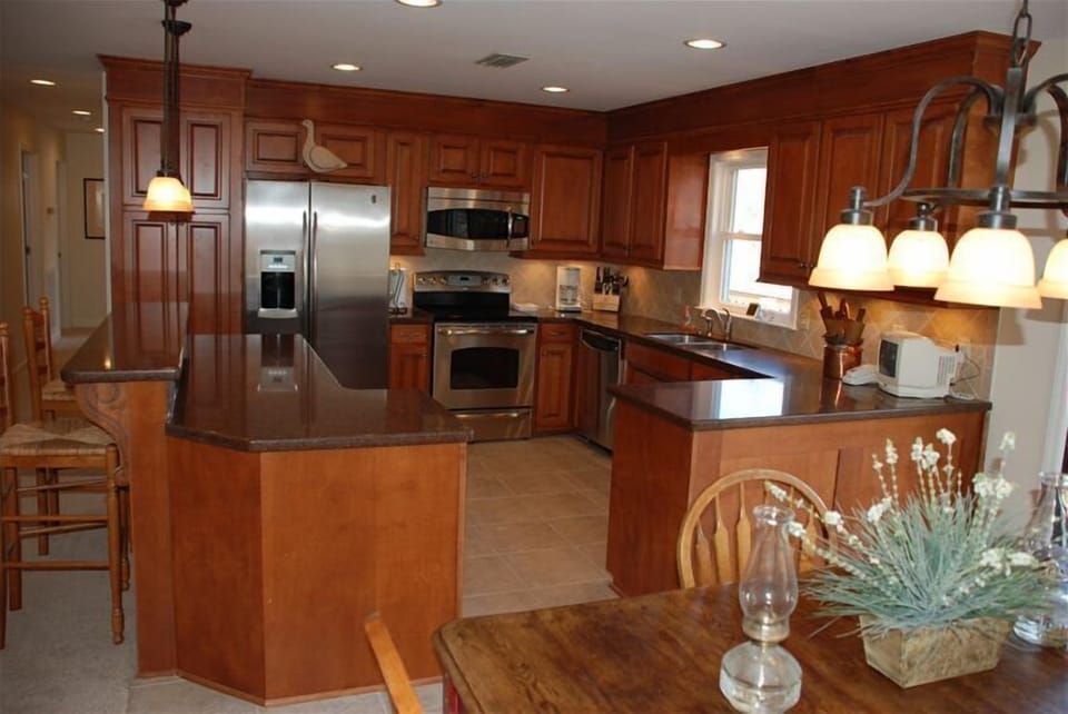New kitchen with all new GE appliances and view of lake