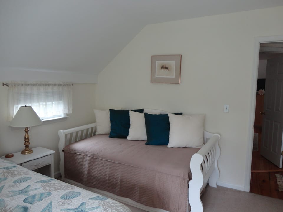 The upstairs front bedroom also has a twin day bed.