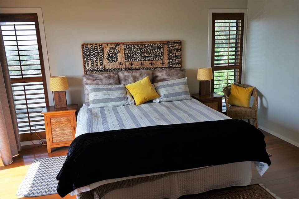 The master bedroom has a king size bed