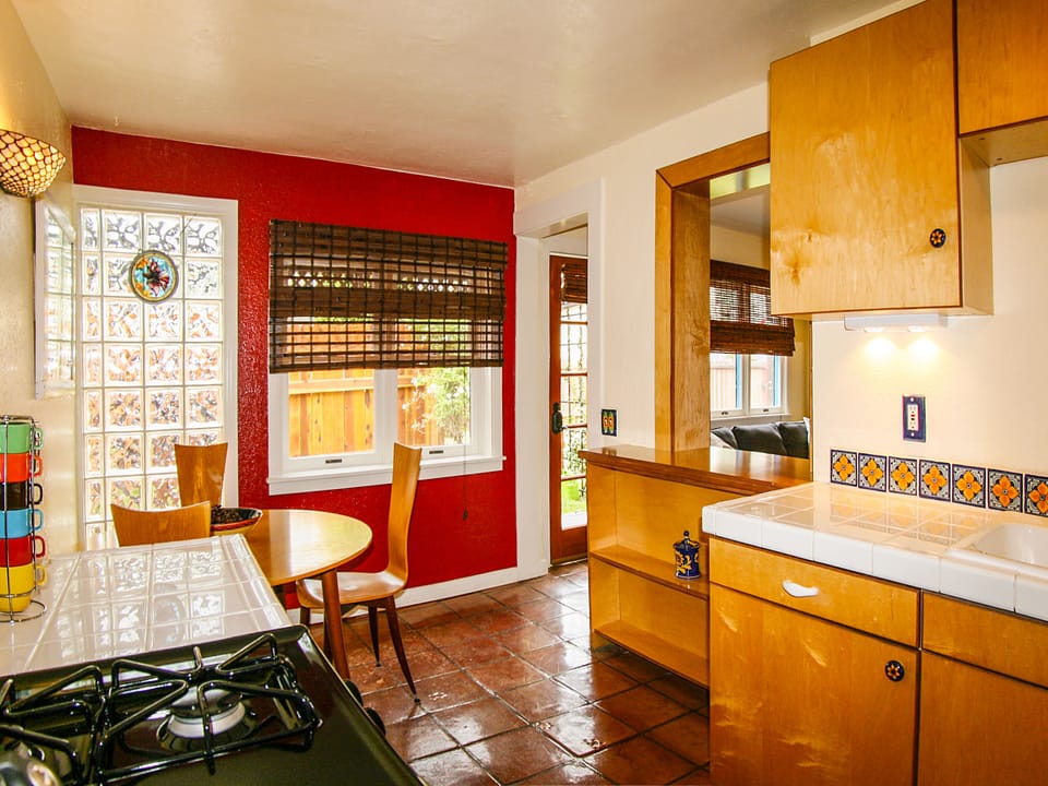 Break-through opening (left) connects Kitchen to Living Room