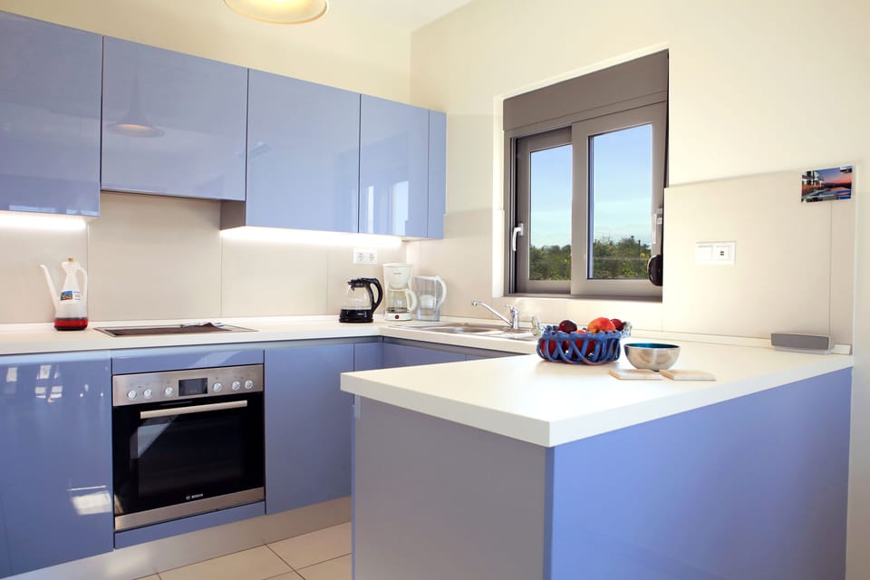 The Kitchen is very light and has fantastic views out across the gardens to the 