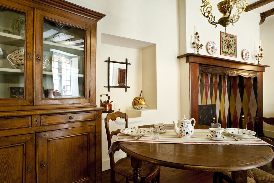 Old stone sink and cooking fireplace