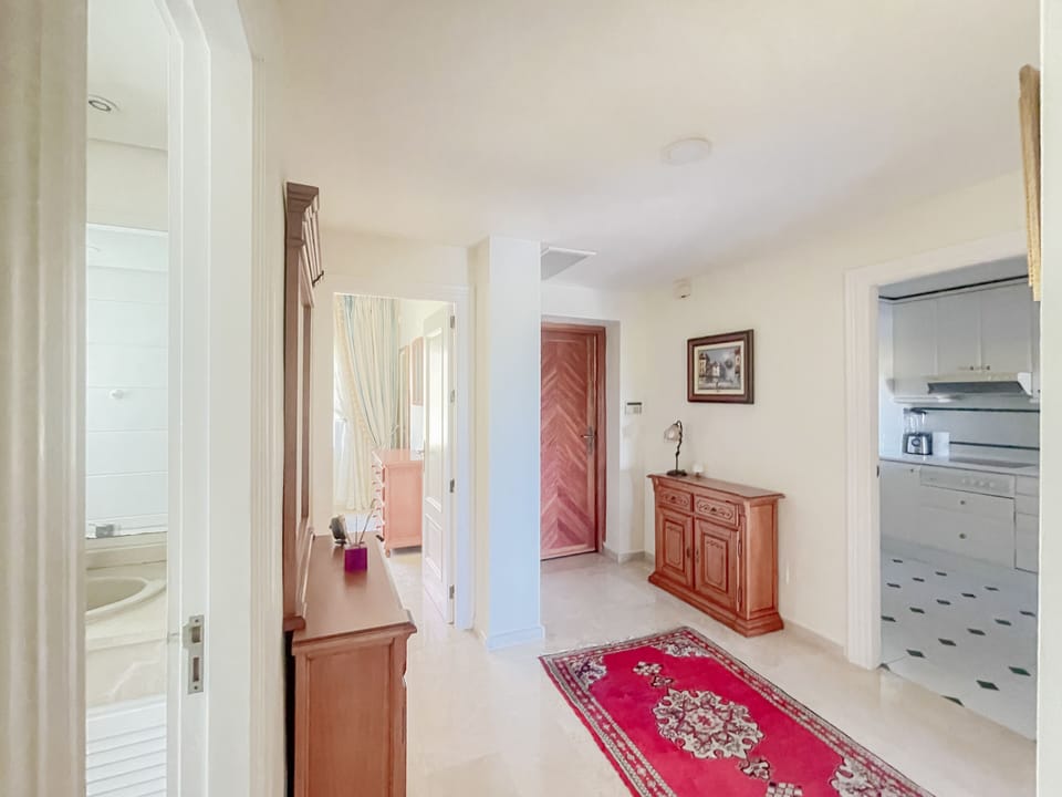  Entrance Hall with Kitchen to the right & Bathroom and 2nd Bedroom to the left