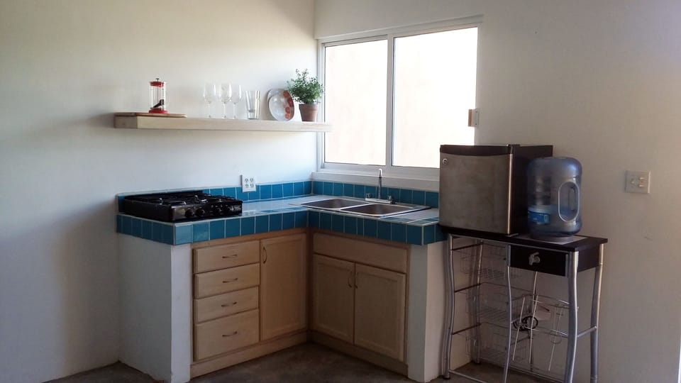 Kitchen with all Utensils and Flatware.  A French Press too