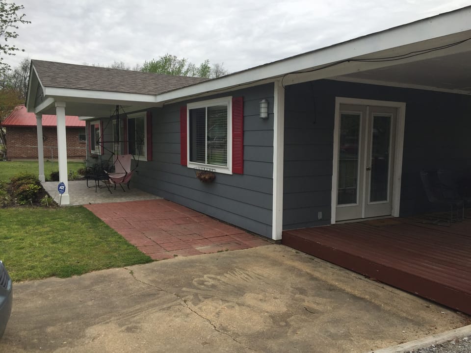 Front of the house and deck off master bedroom