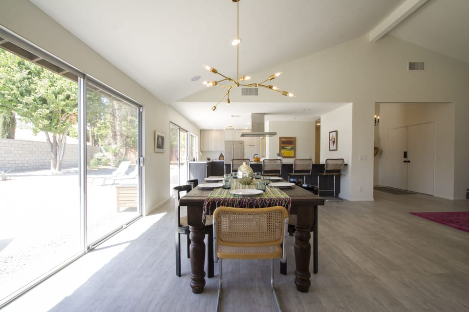 vintage farmhouse table and custom chandelier
