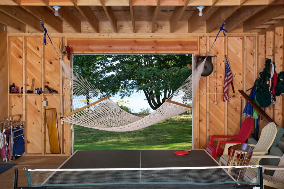 Boat shed with hammock and pingpong table