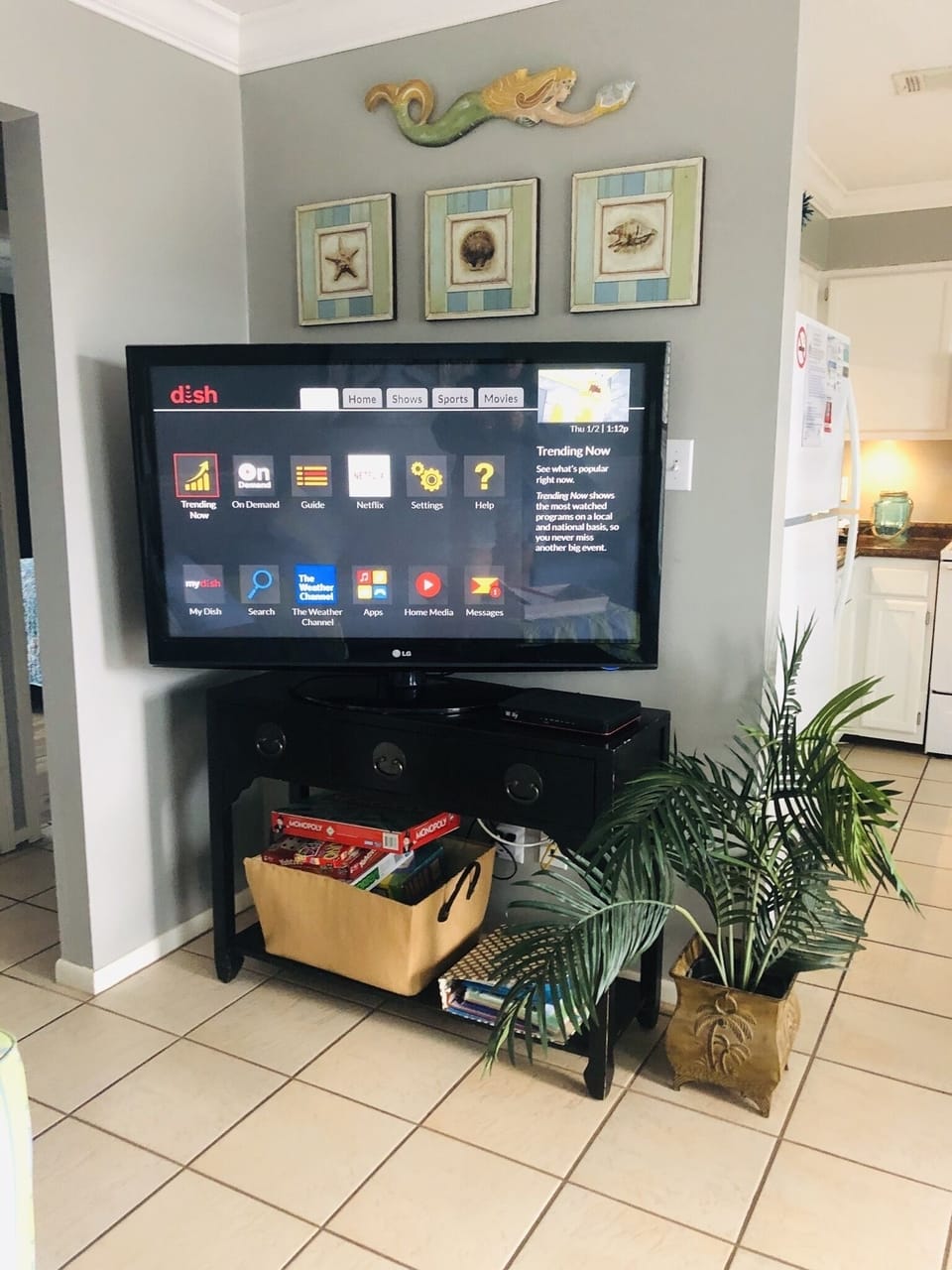 Living area has 55" flatscreen TV w/DISH Network.