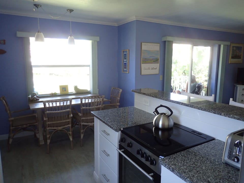 Dining table unfolds to seat 6