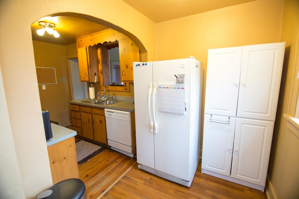 Fully stocked kitchen with gas stove and dishwasher