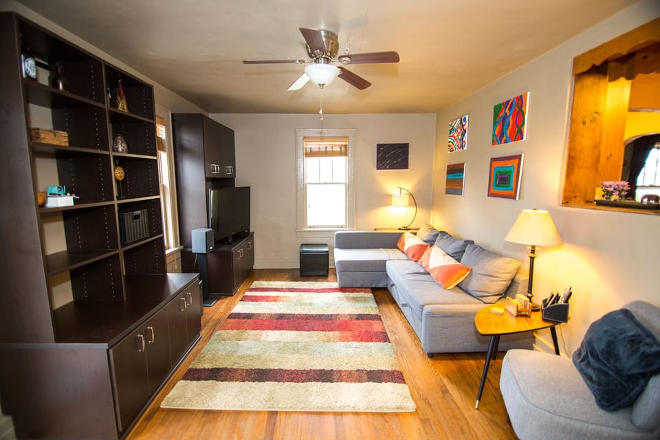 Built-in cabinets in family room provide plenty of storage