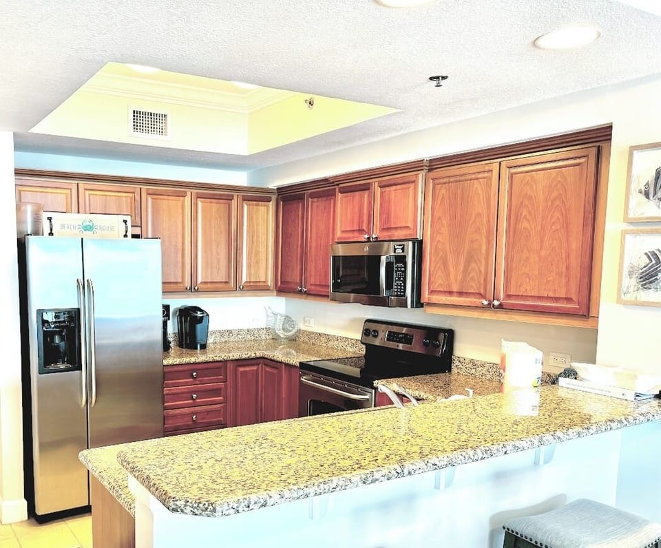 Kitchen with Dishes, Silverware, Pots & Pans.  Drip and Kuerig Coffee makers