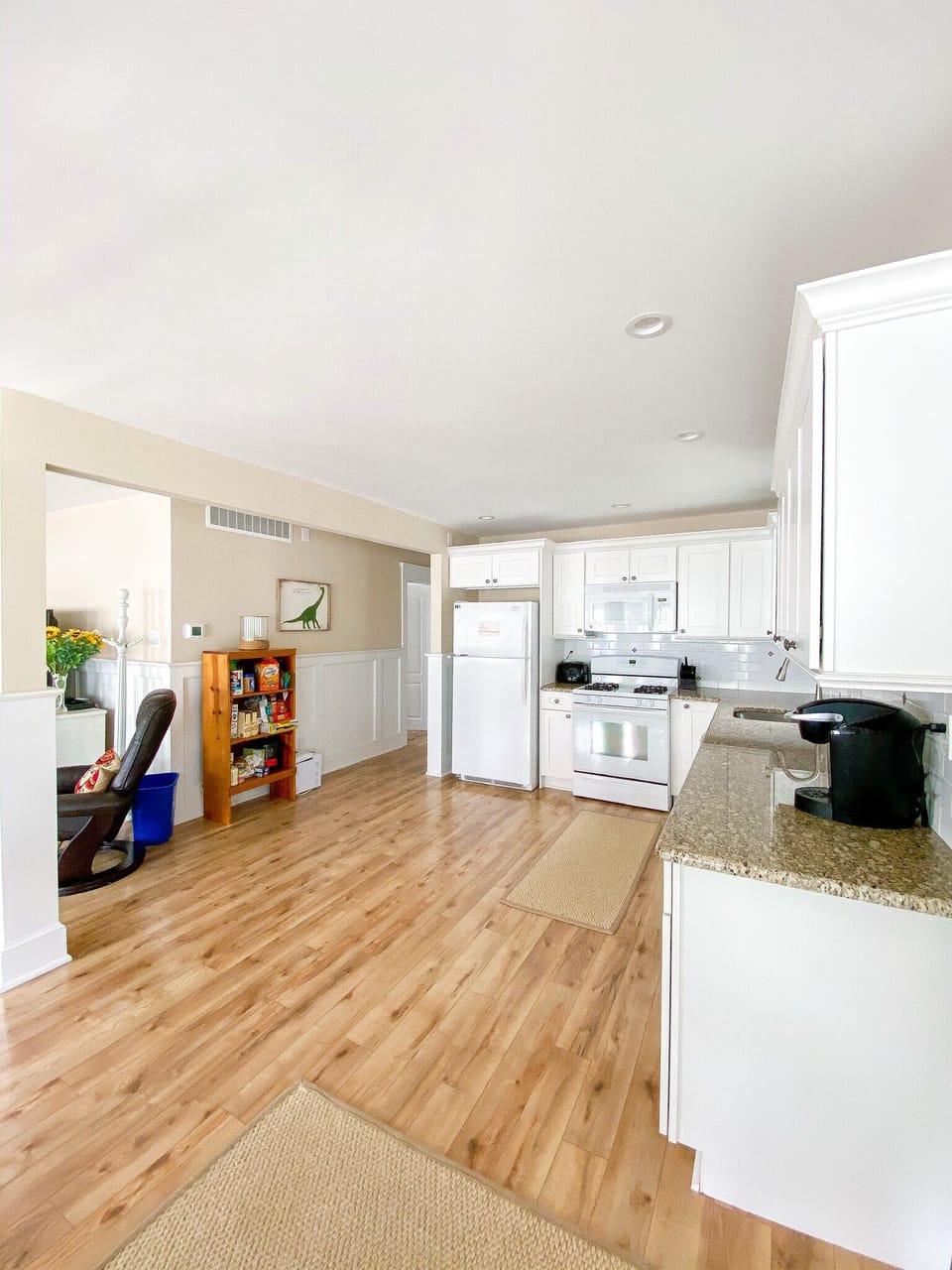 View of kitchen from front door. 