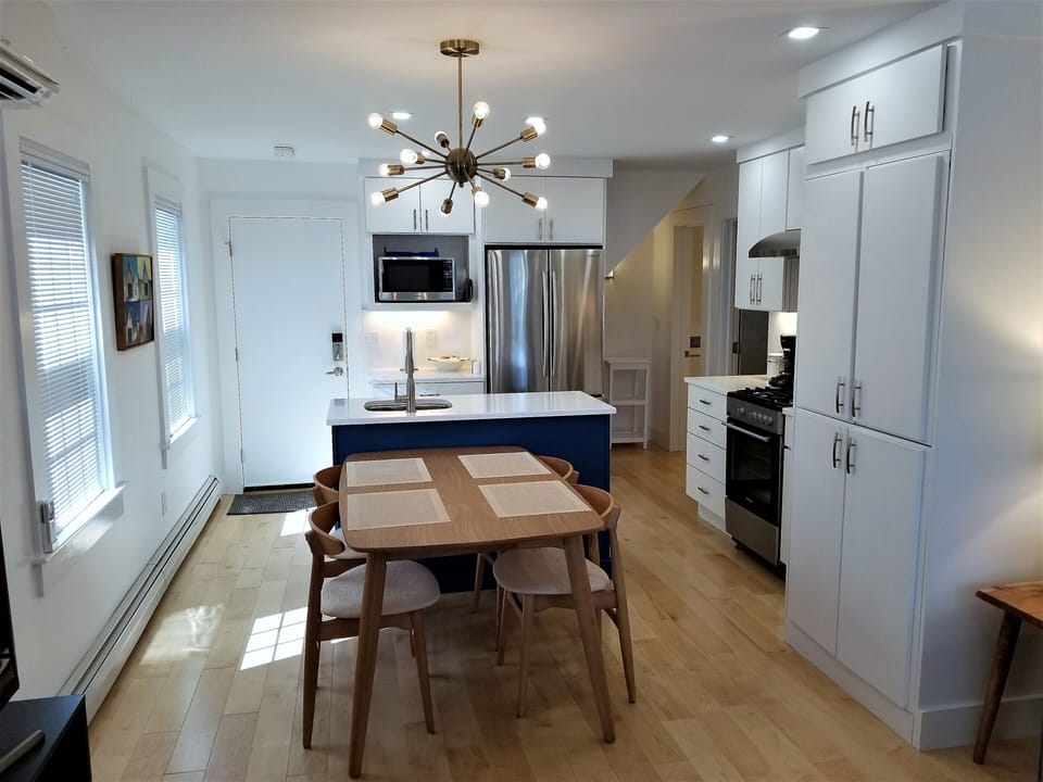 Open plan living, dining, kitchen.
