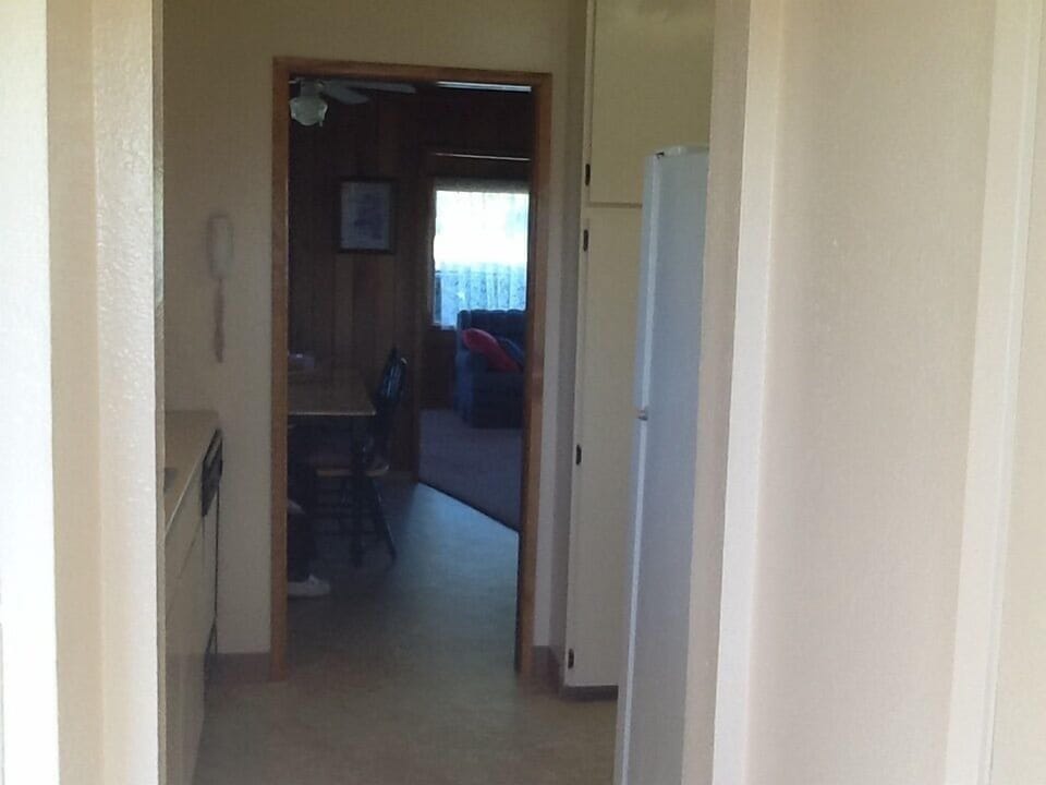 view through kitchen into dining room