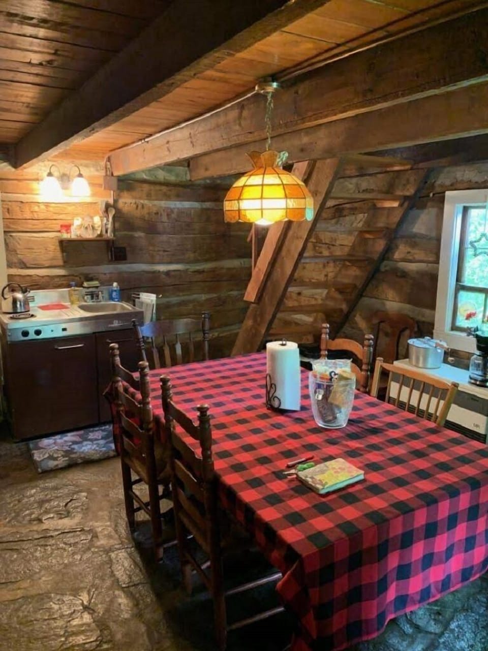 Dining area in the old part of the Cabin. Large refrig, Microwave