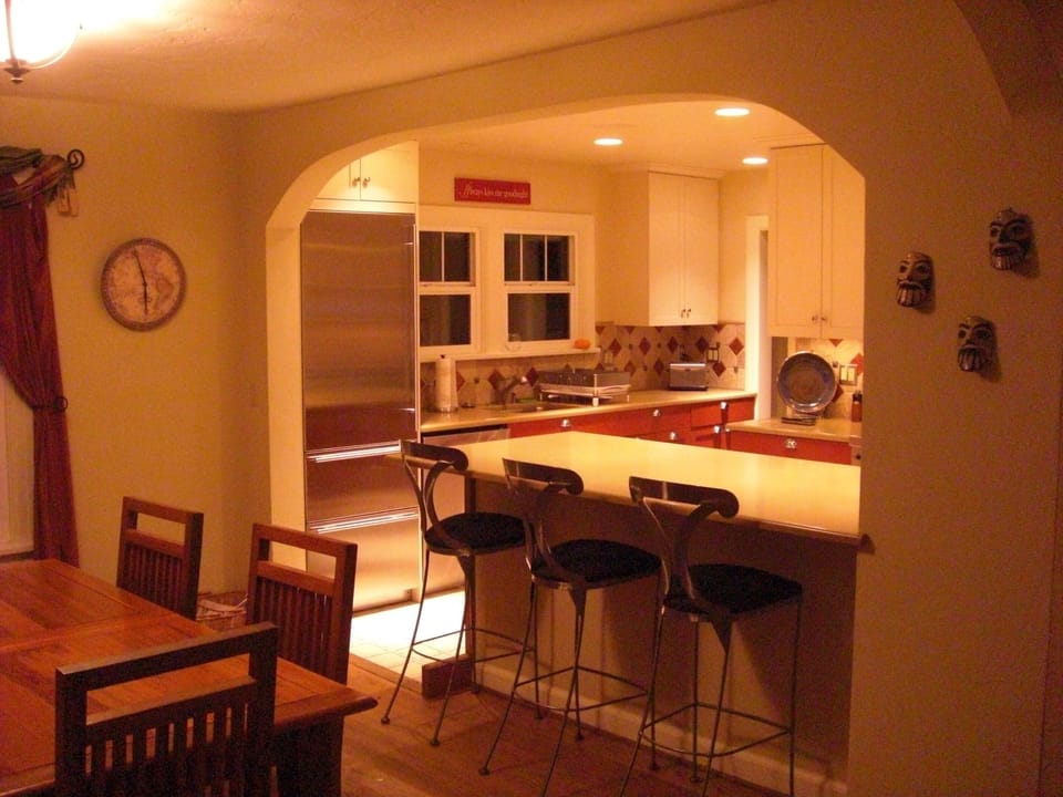 Open kitchen / dining floor plan.  View from dining area into kitchen.