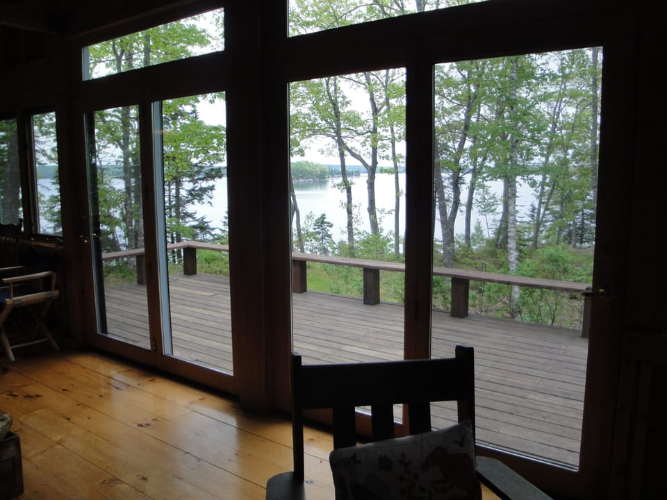 Inside view looking out to deck and ocean