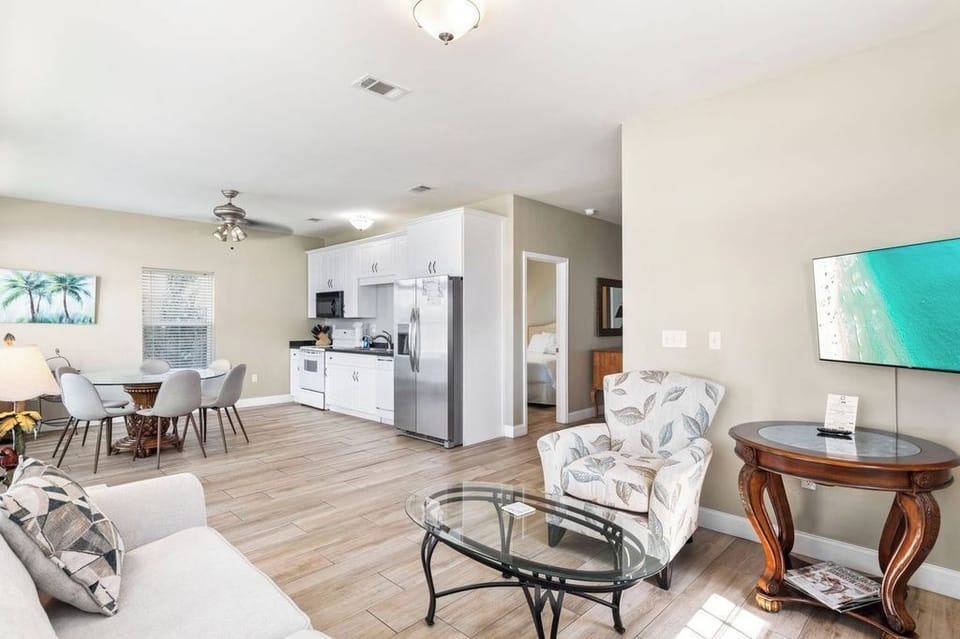 First Floor: Bright open-concept with a full kitchen, comfortable living area, and dining space.