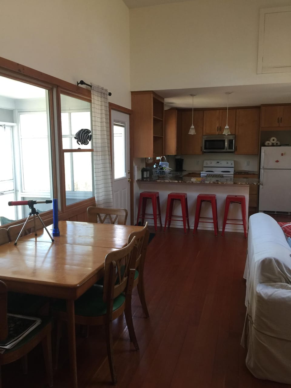 kitchen /dining/living area with beautiful view of the pond